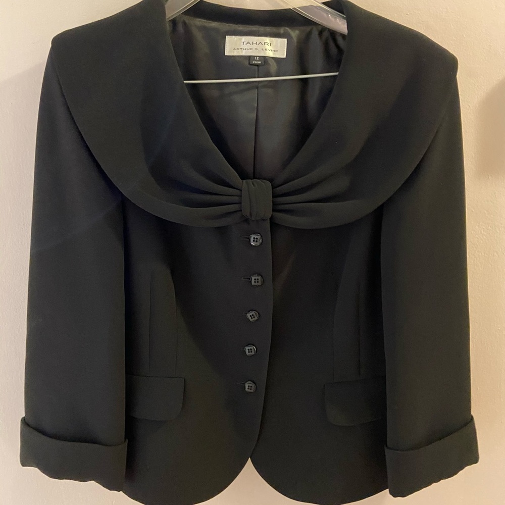 Tahari Black suit fully lined.